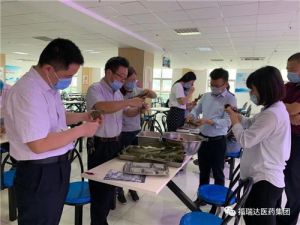 福瑞达医药集团举行“粽香端午”包粽子活动</a>